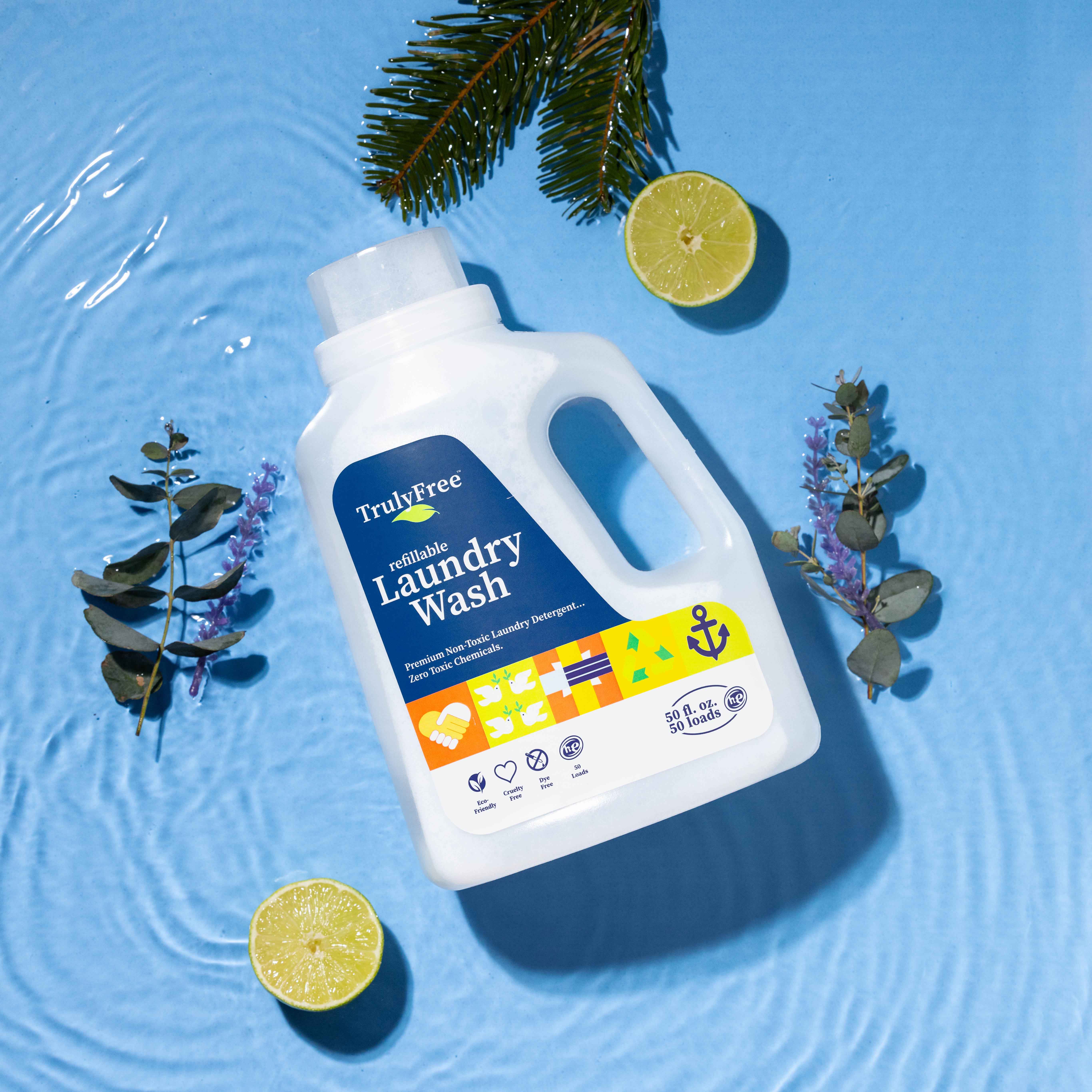 Truly Free Signature Scent Laundry Wash laying down in water Pine, Lime, and lavender